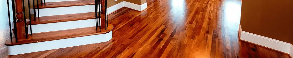 Base floor of a staircase with professionally restored wood flooring in Boca Raton FL